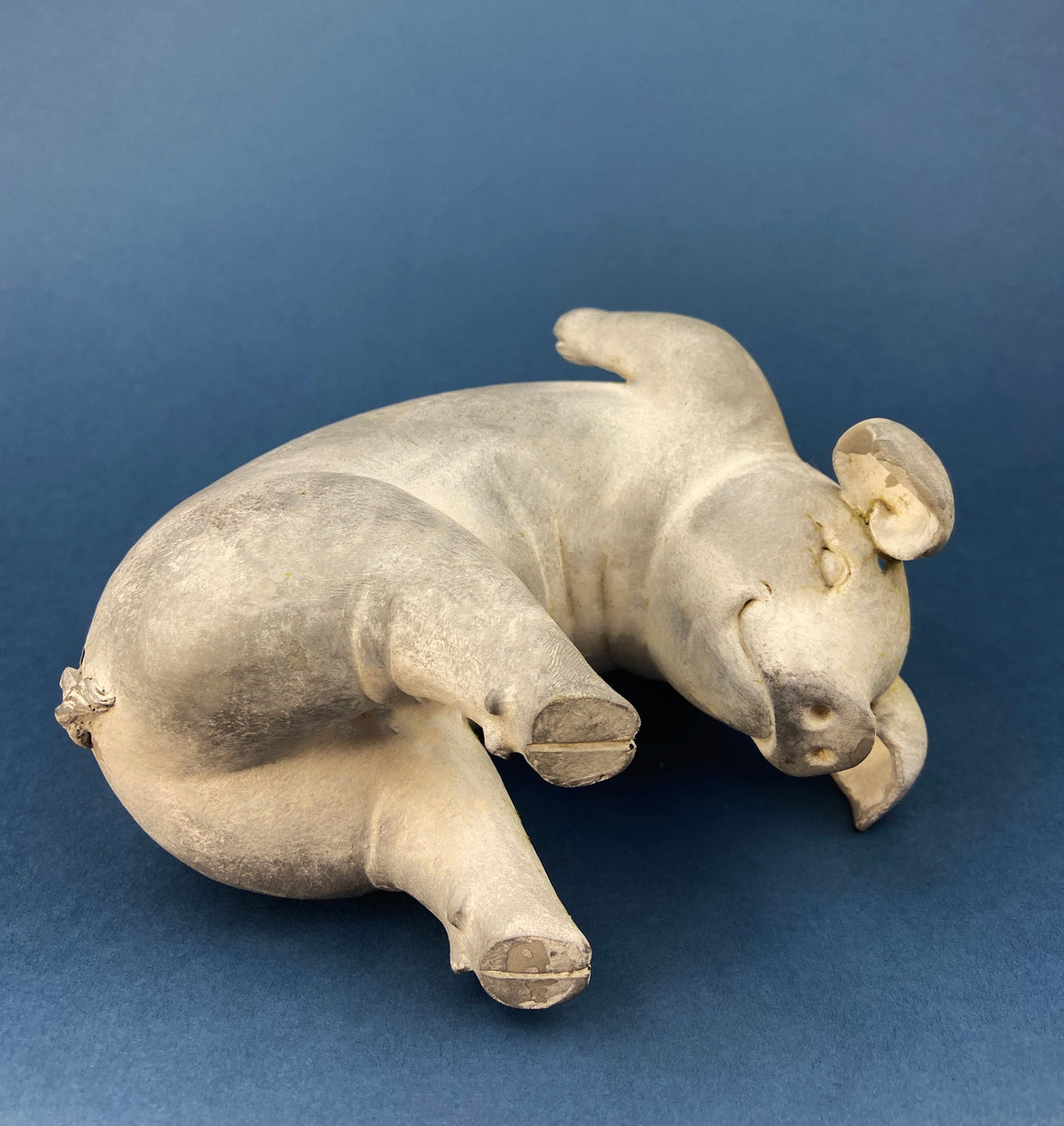 Funny Piglet Figurine. Frolicking and Smiling Pig.